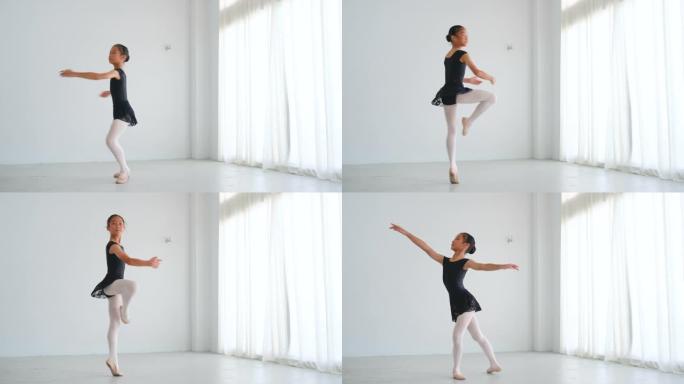 亚洲芭蕾小女孩站在房间里用白色墙壁和窗帘抬起腿练习跳舞