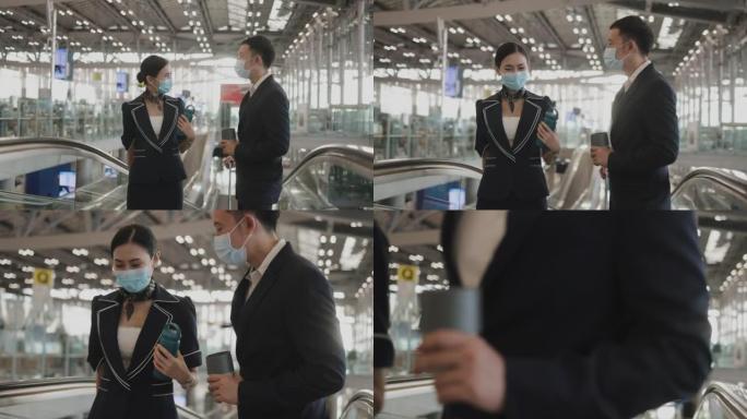 两对年轻夫妇乘务员带着旅行杯零浪费想法走在一起，然后在机场门口加入另一个队友-股票视频