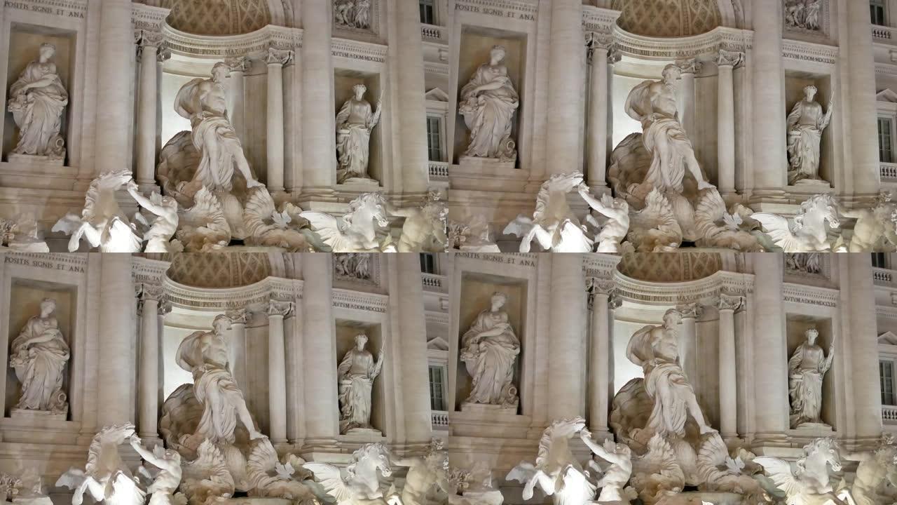 傍晚的特雷维喷泉雕像，带有照片闪光灯，灯光和水反射，4K