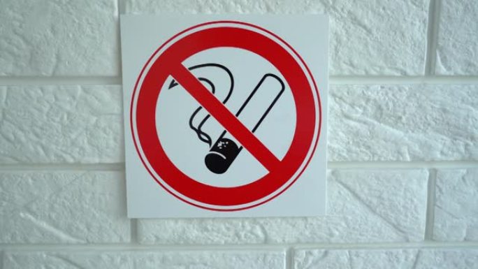 禁止吸烟标志。墙上挂着禁止吸烟的标志。4k素材。