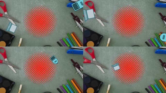 笔记本电脑和书包用文具在桌子上的红点上弹跳的动画