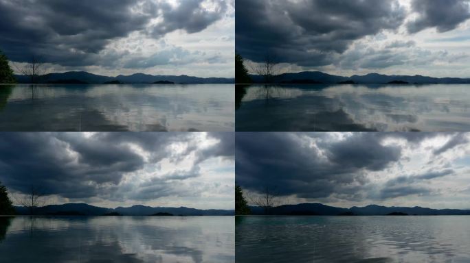 雨前天空乌云流动湖面水波延时