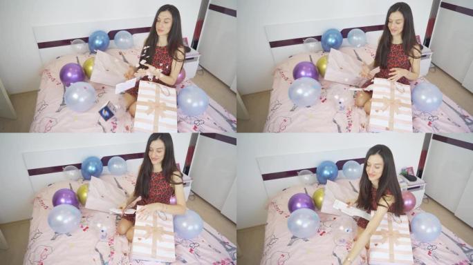 惊讶的女人打开五彩纸屑炸弹信封的慢动作