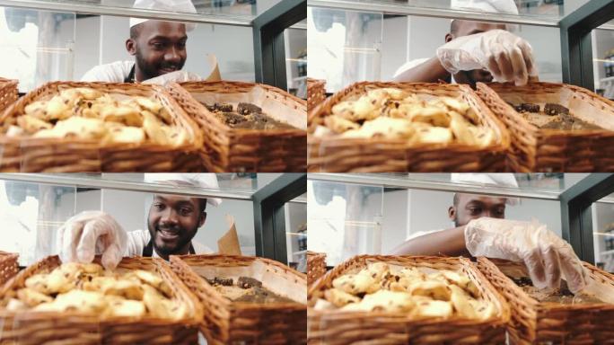 非裔美国面包师在自助餐厅卖面包