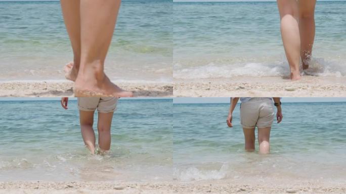 夏季赤脚独自在沙滩上行走的特写，女性的脚踩在海上