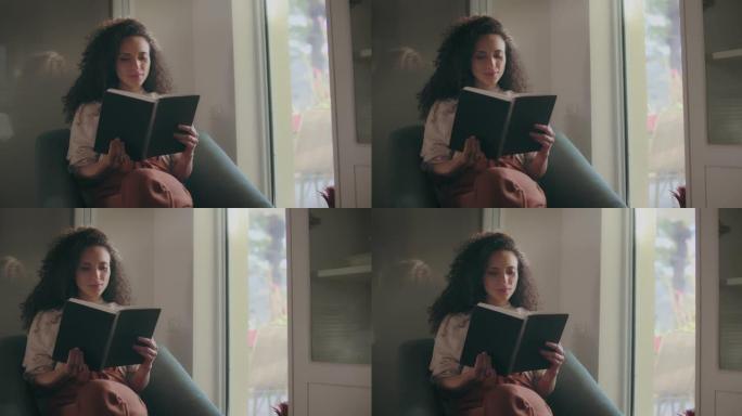 混血女人在窗边读书