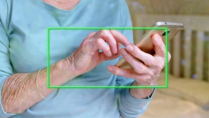 使用智能手机在女人身上发光的绿色框架动画