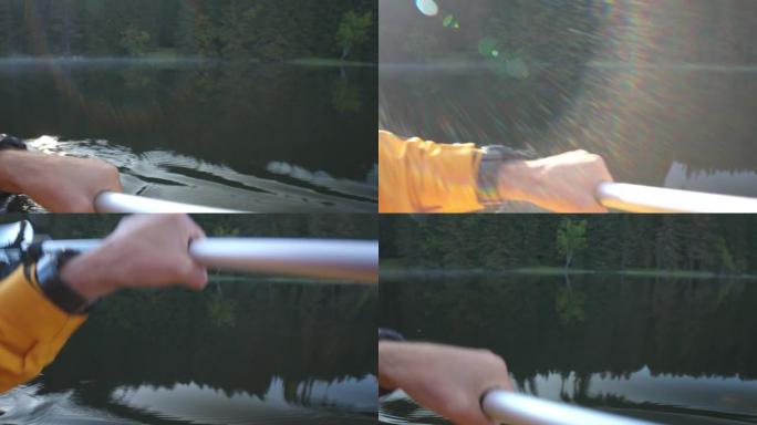 在山湖划独木舟，观点。划桨和旅游。