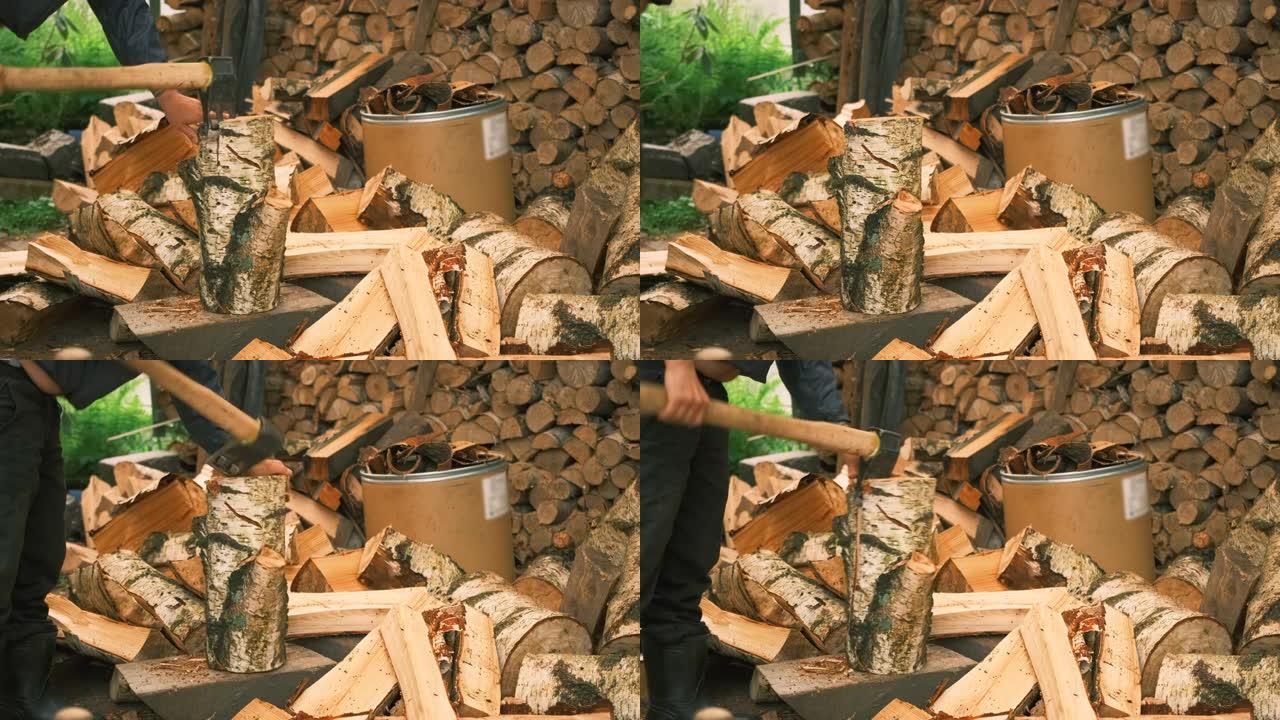 一个人在小屋的院子里工作，旁边是一个大木头-用切肉刀将木头切成两半。