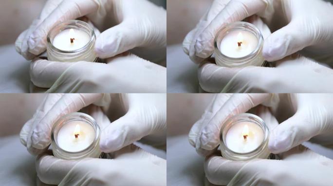 用于修脚和足部按摩的芳香油蜡烛。