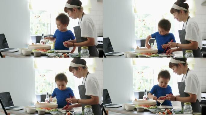 在虚拟烹饪课活动中，母子一起制作temaki寿司卷
