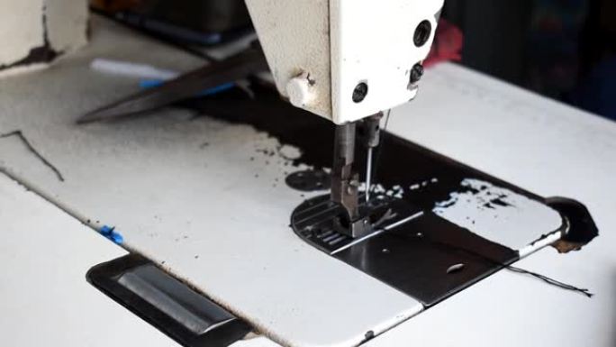小企业服装生产理念。缝纫机的工作宏细节