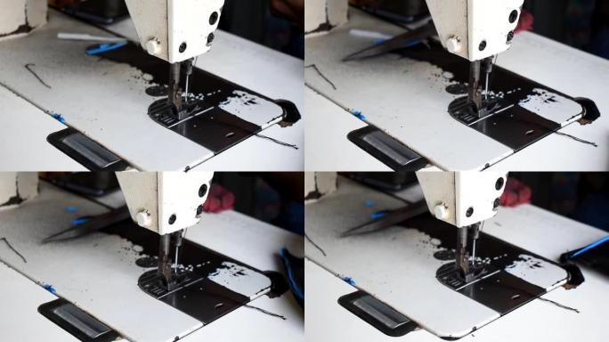 小企业服装生产理念。缝纫机的工作宏细节