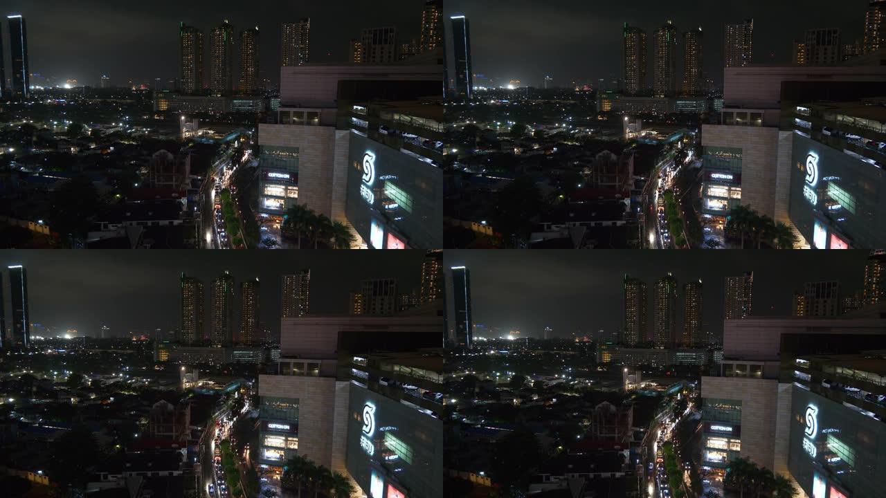 夜间照明雅加达市市中心交通街著名购物中心屋顶全景4k印度尼西亚