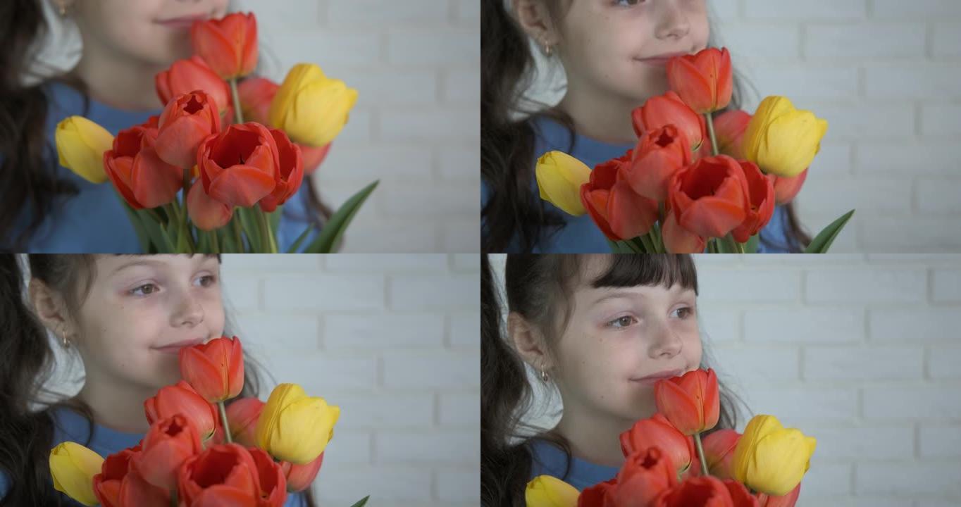 女孩在房间里拿着郁金香。