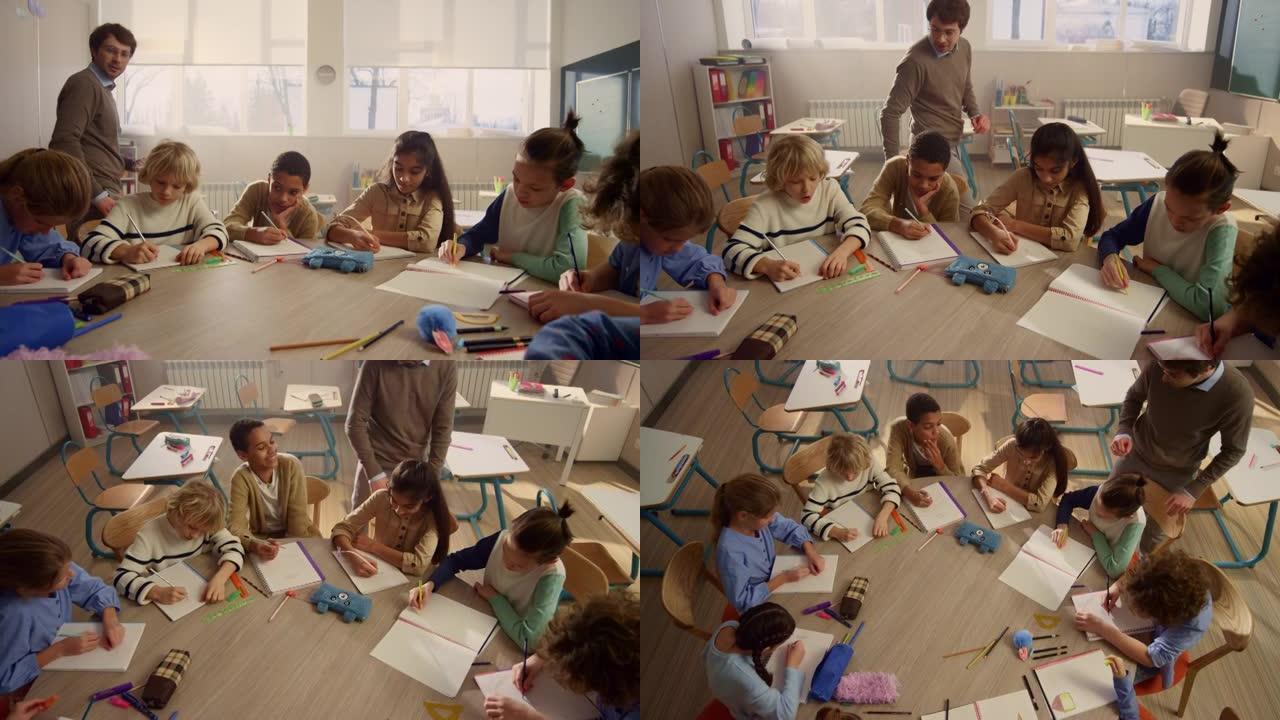 学生在圆桌会议上画笔记本。快乐的孩子用铅笔