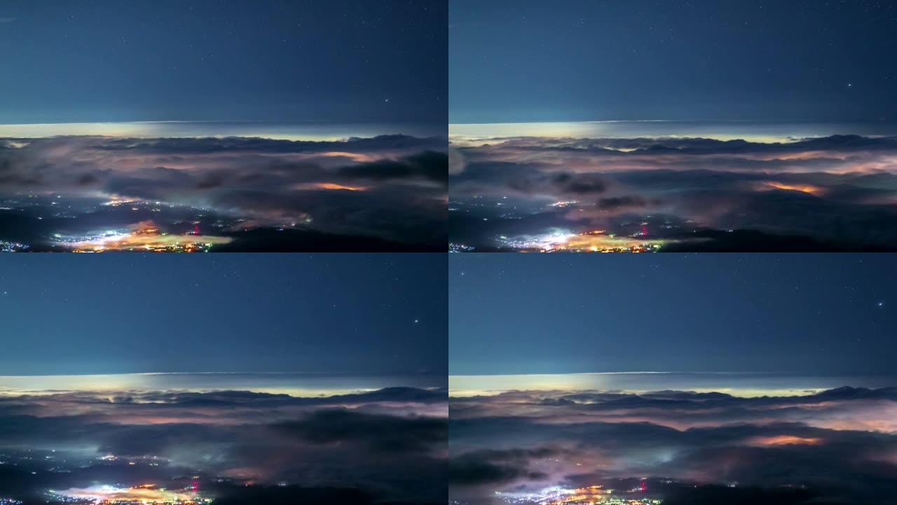 从富士山入口处的云海和星空。富士Subashiri到城镇的延时