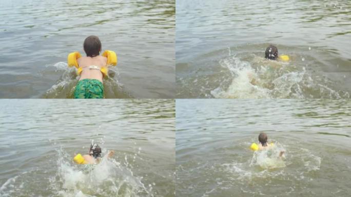 儿童淹没在水中的黄色游泳漂浮物保护。