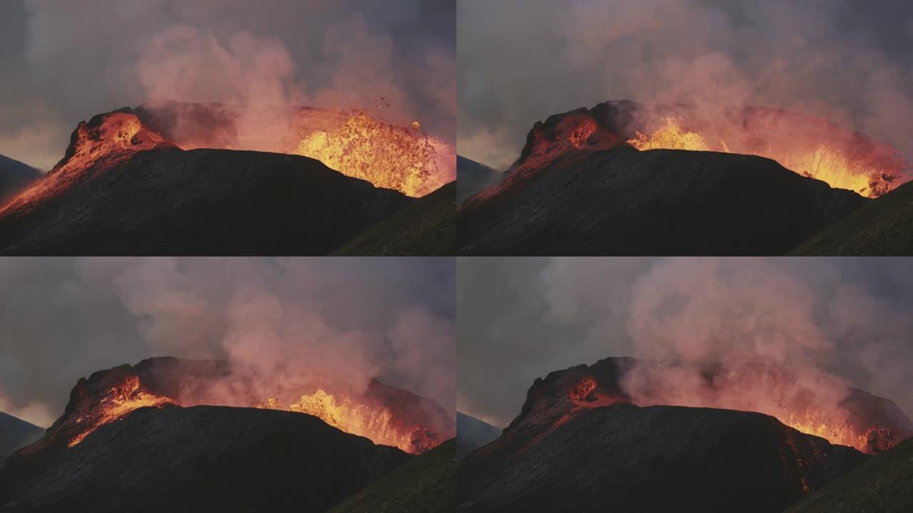 Fagradarsfjall火山喷出的熔岩和烟雾