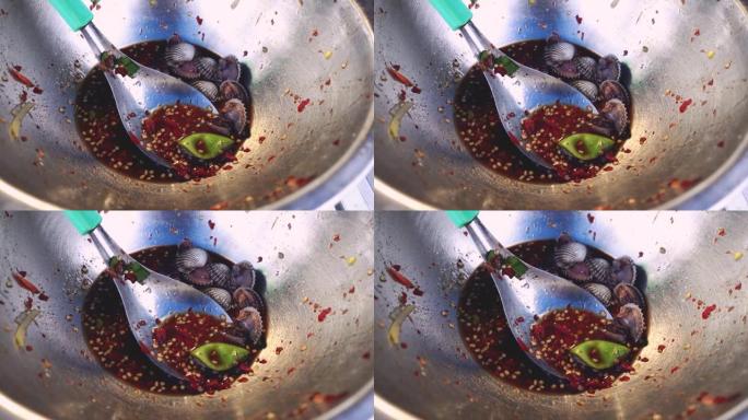 在不锈钢碗中由血蛤制成的辛辣沙拉。