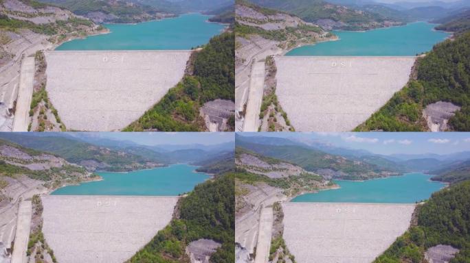 阿拉尼亚暗淡大坝。夹。大山里拦水的大坝俯视图。大坝水库中的绿松石水。土耳其的巨大水坝