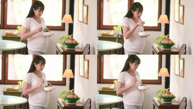 孕妇在家吃沙拉