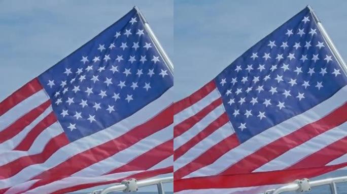 在西班牙海岸线附近的大西洋上，由自动驾驶员驾驶的帆船上的美国国旗