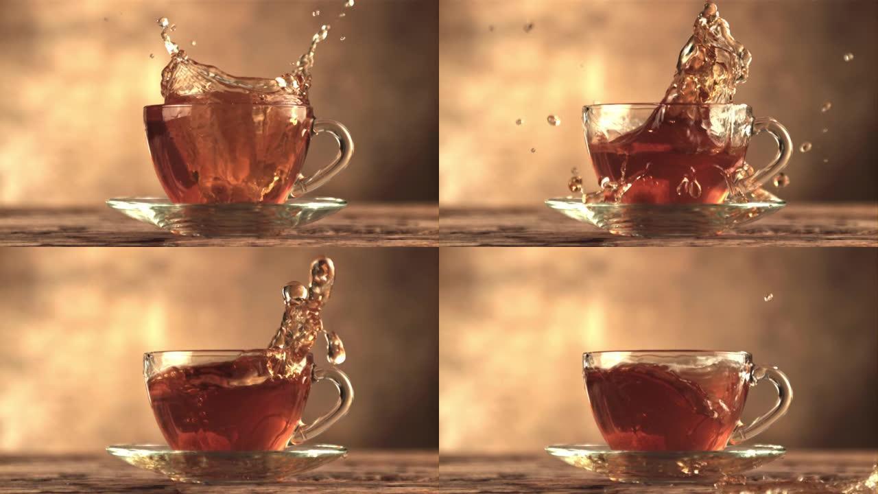超级慢动作一块蔗糖掉进一杯茶。在1000 fps的高速相机上拍摄。
