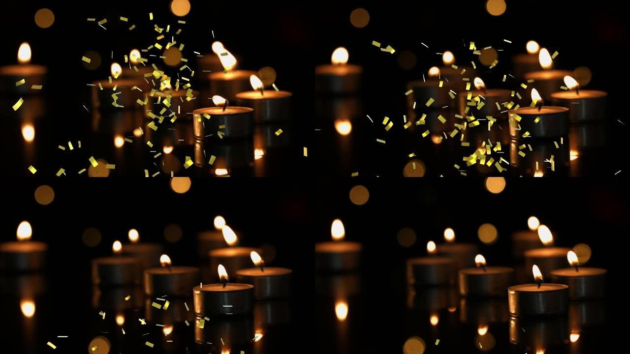 金色五彩纸屑掉落的动画点燃了带有bokeh灯和深色背景的茶灯蜡烛
