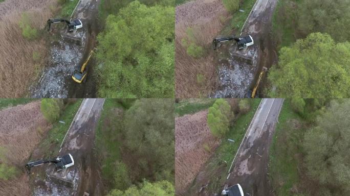 断桥，河流上的履带式挖掘机断路结构被摧毁的道路