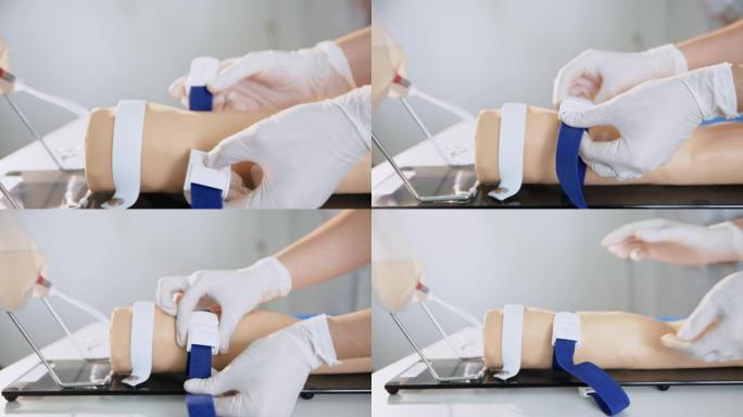 人体手臂模型上的护士紧固带