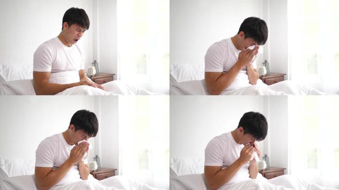 病男打喷嚏，用纸巾擦鼻子