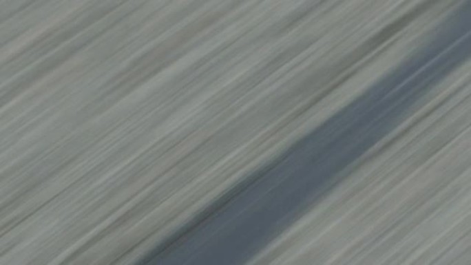 无缝循环赛车涡轮增压汽车和摩托车在路面背景之上的速度。抽象模糊壁纸概念。4k镜头视频。高速公路飞行，