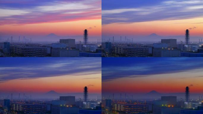 黄昏时的川崎工业区和远处看到的富士山