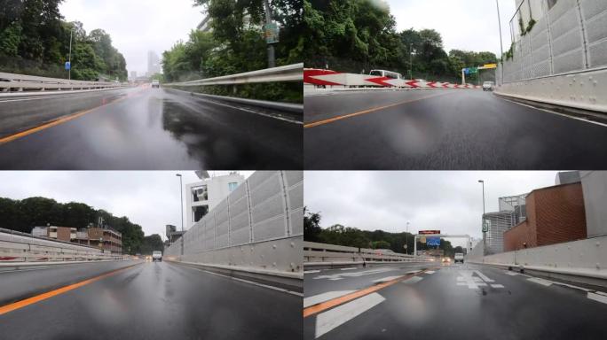 雨天在高速公路上行驶。向后看