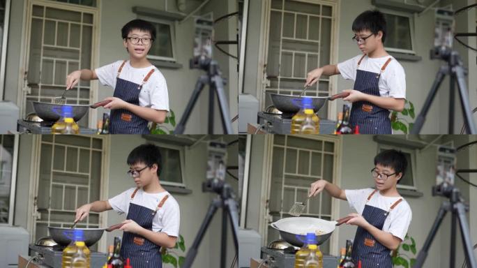 亚洲华裔少年男孩在后院厨房教授烹饪广播。