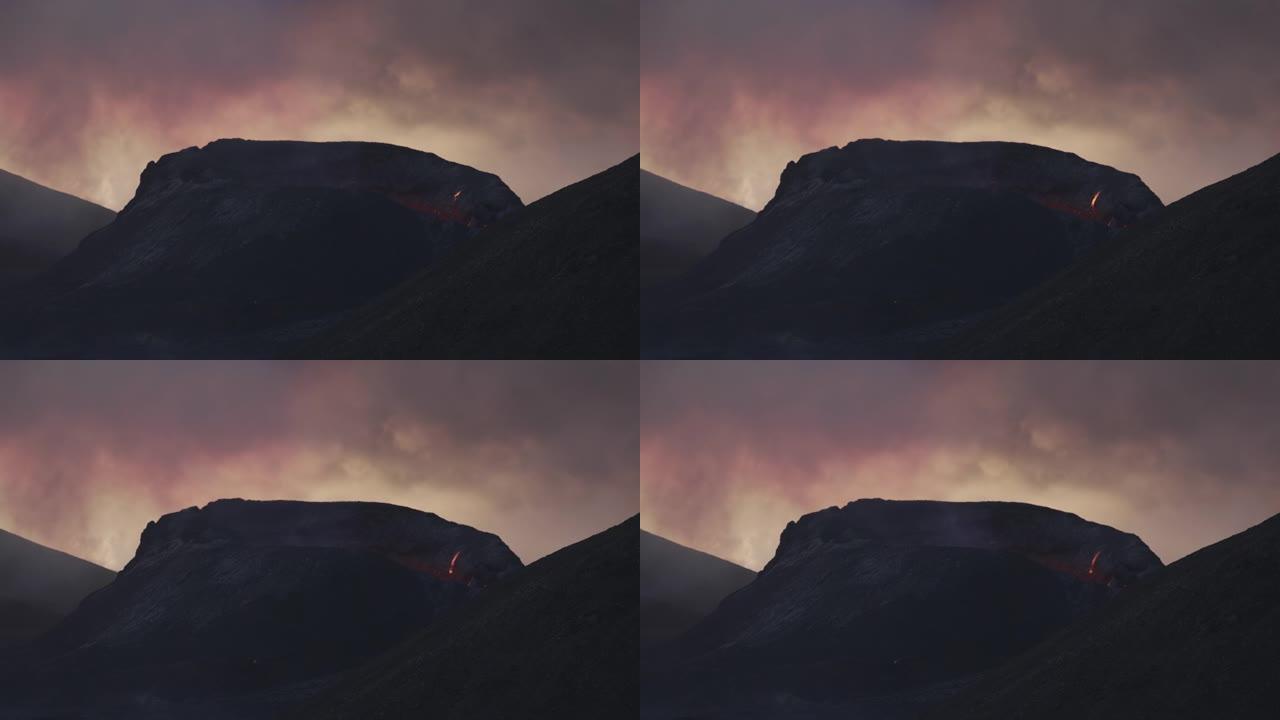 Fagradarsfjall火山喷出的熔岩和烟雾