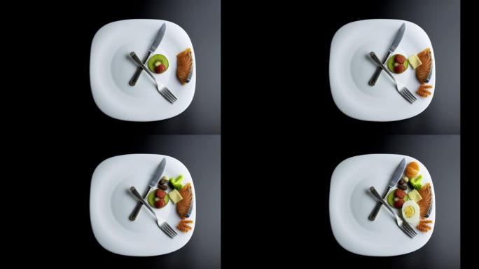 用叉子和刀子的手模拟时钟的盘子显示食物，间歇性禁食的概念