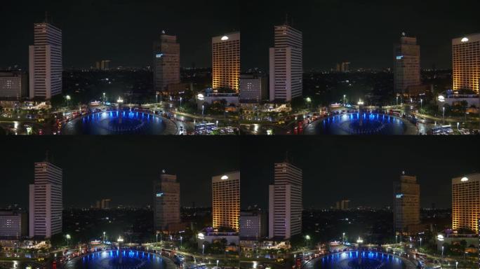 夜间照明雅加达市中心交通街圈喷泉屋顶全景4k印度尼西亚