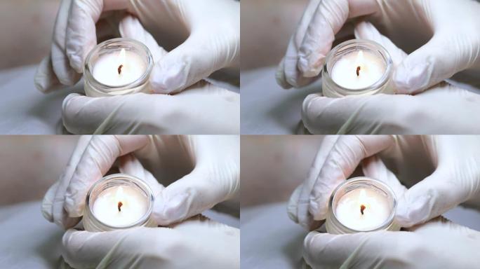 用于修脚和足部按摩的芳香油蜡烛。
