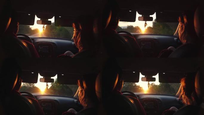 一对已婚夫妇开车旅行，夕阳照亮了他们