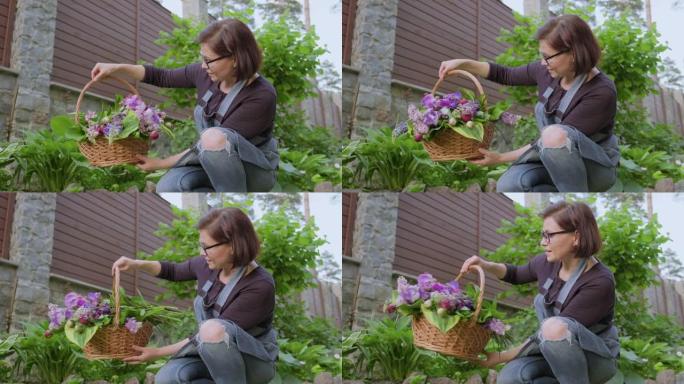 女园丁，花园里的花店，带着一篮子新鲜采摘的花园春花