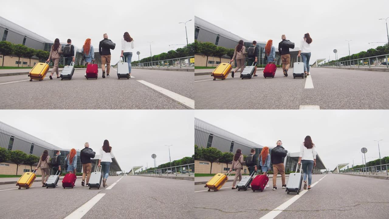 游客旅客跑到机场航站楼。航班延误。年轻人带着行李跑到机场航站楼。