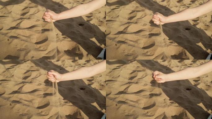 女人手拿沙子的万向节镜头