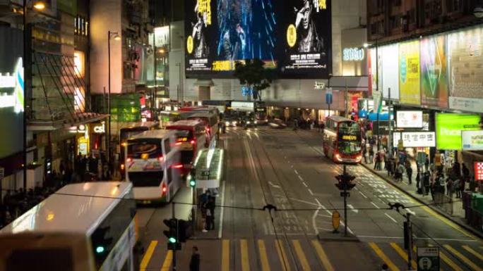 中国香港-2019年1月8日，2019年1月8日，中国香港，晚上，4k延时步行过马路的人群。交通交通