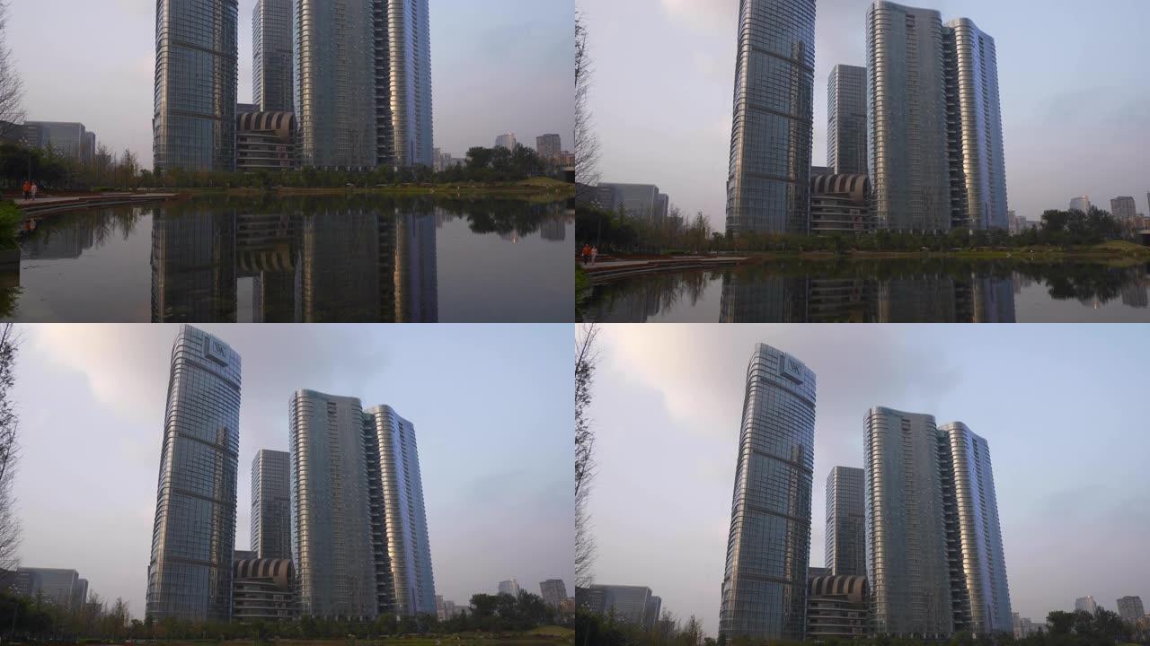 日落时间成都市著名现代公寓住宅湖全景4k中国