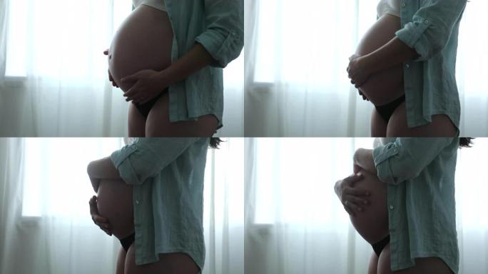 孕妇用窗帘摸肚子