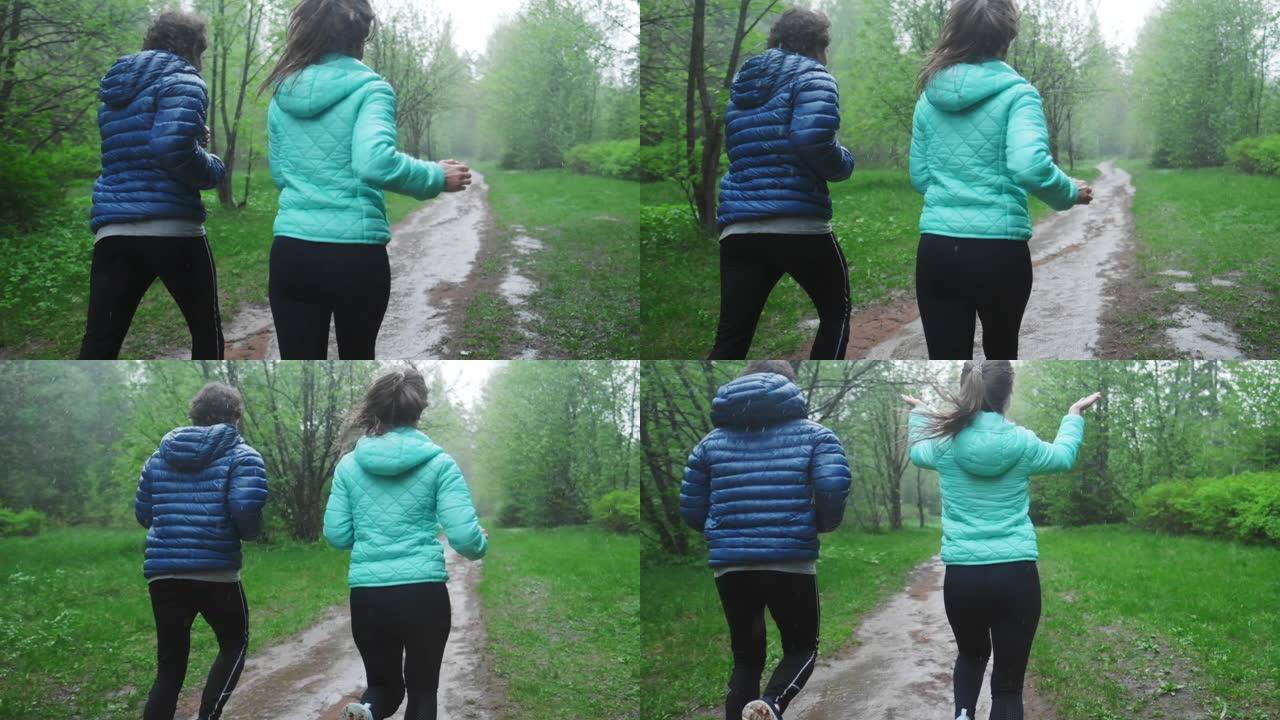 在雨中锻炼。夫妇在公园的强雨中奔跑，周围绿树成荫