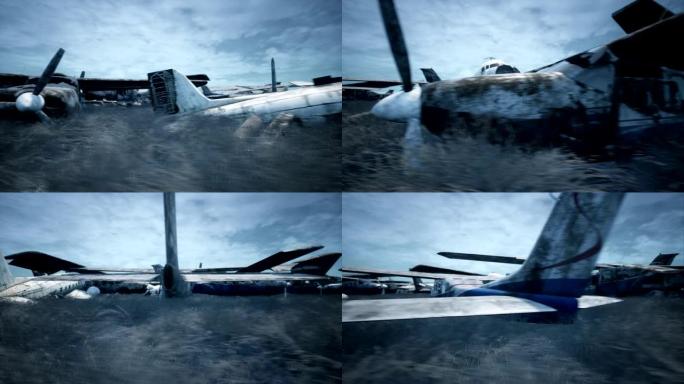 生锈和破碎的飞机站在一片朦胧的蓝天下。许多被摧毁的，被摧毁的，被遗弃的飞机。
