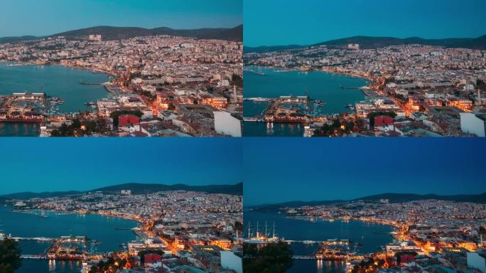 土耳其艾登省库萨达斯。夏季傍晚的海滨和库萨达斯城市景观。土耳其爱琴海海岸库萨达斯天际线的夜景。全高清
